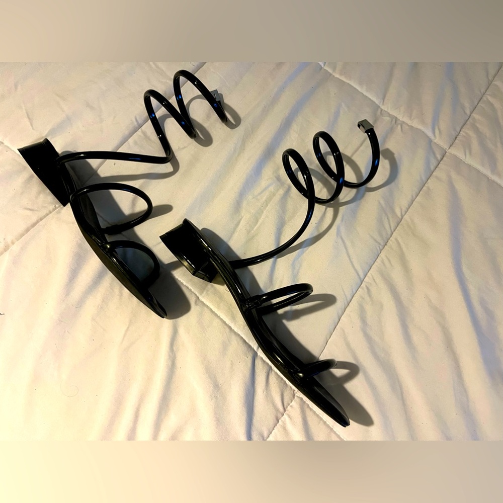 Black strappy sandles, have about 1 1/2 in heel, very cute and comfortable.